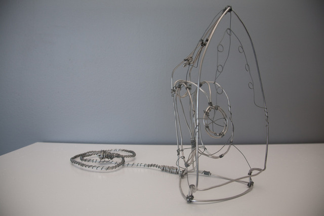 Sculpture of an iron made from galvanized wire